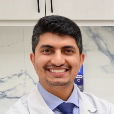 A headshot photo of Dr. Amjad Ali