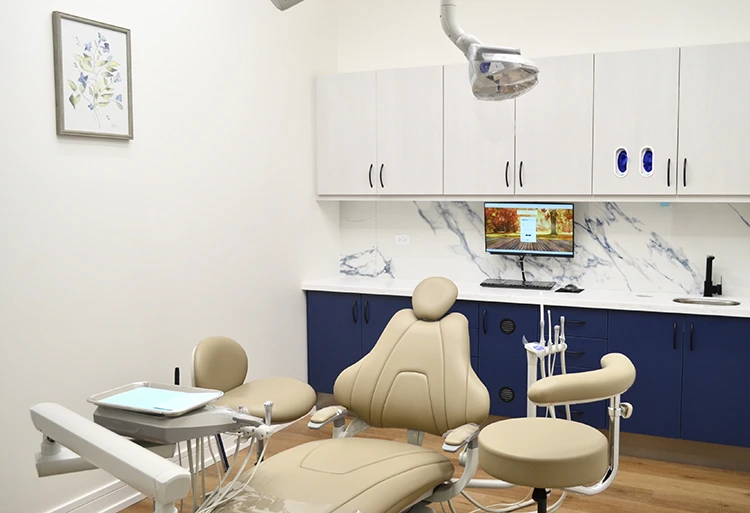 An exam room in Smile Circle Dental with equipment for patient exams