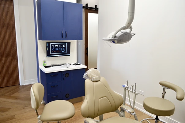An exam chair and treatment area at Smile Circle Dental